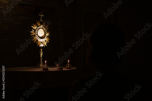 Adoration of the Blessed Sacrament at night in a community chapel in Medjugorje.