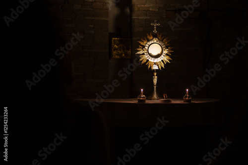 Adoration of the Blessed Sacrament at night in a community chapel in Medjugorje.