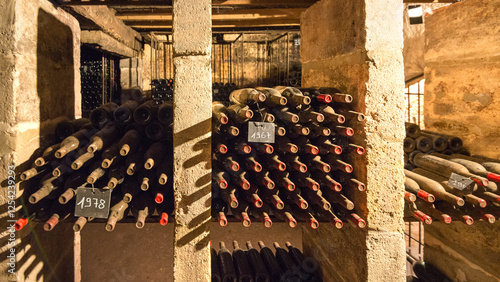 Wine aging process in a traditional cellar of Saint Emilion vineyard region photo