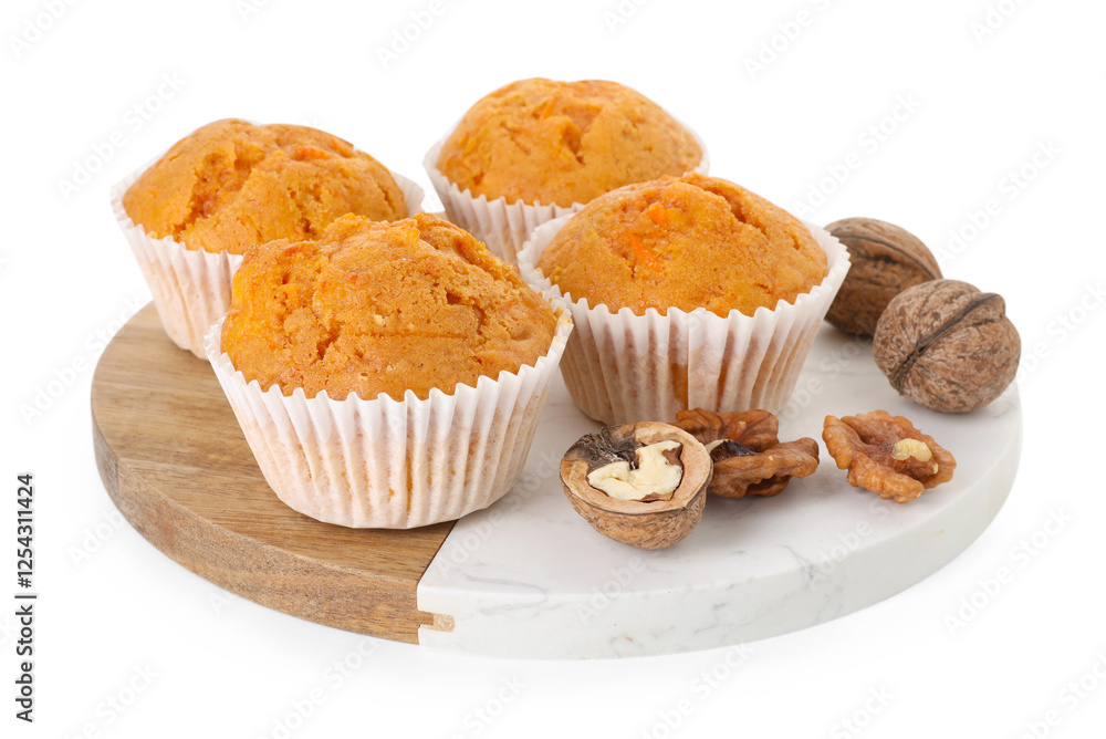 Tasty carrot muffins and walnuts isolated on white Tasty carrot muffins and walnuts isolated on white