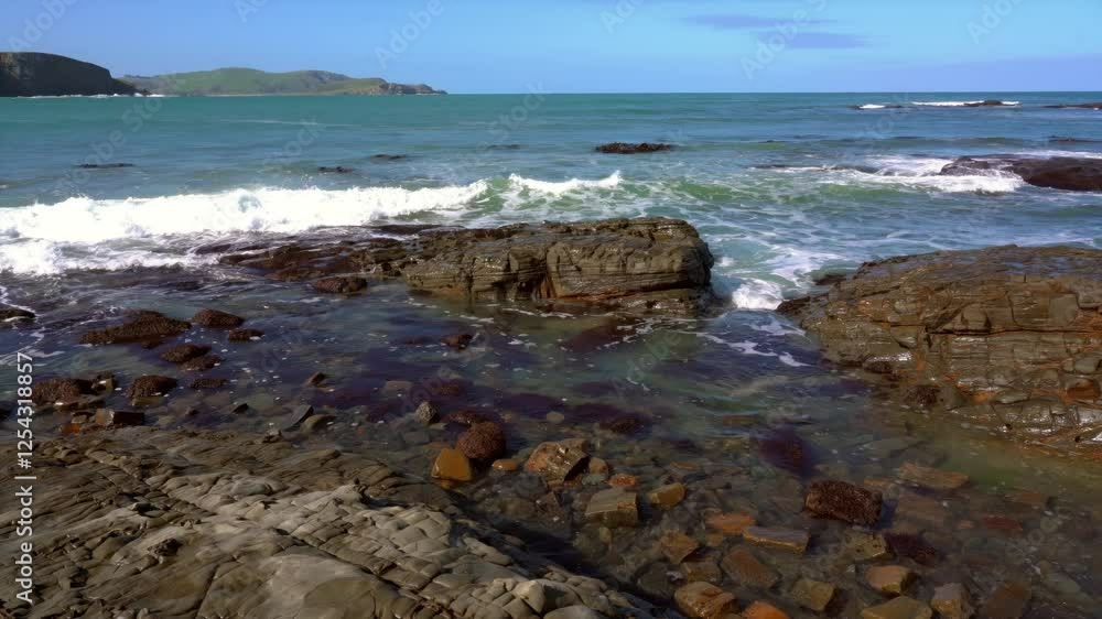 Waves Hitting Coastal Rocks at Jack's Bay – Beautiful Sunny Landscape Waves Hitting Coastal Rocks at Jack's Bay – Beautiful Sunny Landscape