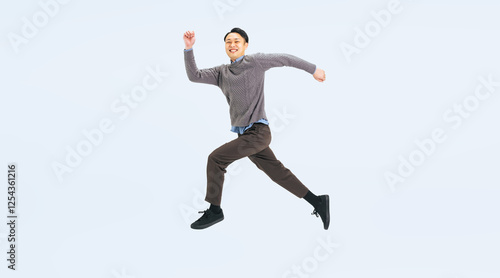 Wallpaper Mural ジャンプするカジュアルウェアのミドル男性の全身写真（切り抜き背景透過PNGも販売しております。作成者リンクから「PNG」で検索してください） Torontodigital.ca