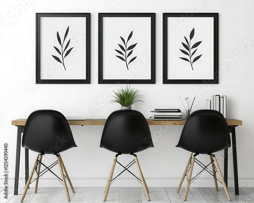 3 black and white picture frames, blank inside the frames, hanging on a wall above two modern desks with chairs in front of them, against a white background Copy space