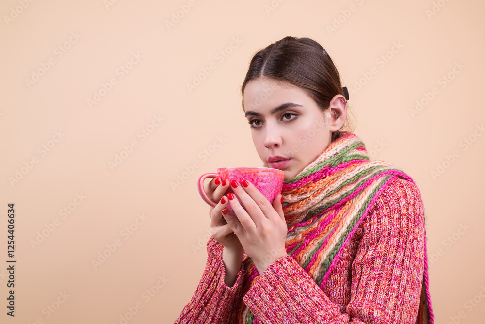 Sick woman drink medicine from mug. Woman holding a mug with hot drink for flu symptoms. Ill woman sipping tea to ease flu symptoms. Medicine for flu in cup, ready to drink. Sick woman, flu symptoms. Sick woman drink medicine from mug. Woman holding a mug with hot drink for flu symptoms. Ill woman sipping tea to ease flu symptoms. Medicine for flu in cup, ready to drink. Sick woman, flu symptoms.