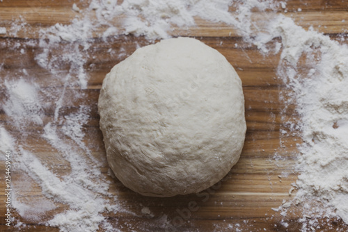 A Loaf of Homemade Sourdough bread dough is bulk fermenting and ready to be shaped and proofed. 