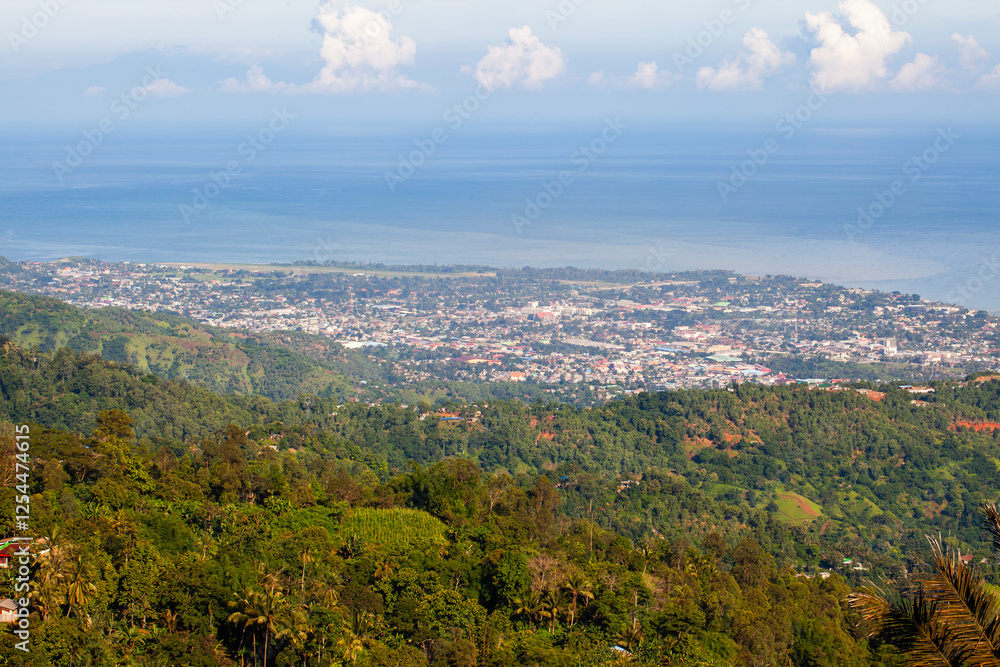 A beautiful view of Dili, the capital of East Timor, seen from a hill on the outskirts of the city. A beautiful view of Dili, the capital of East Timor, seen from a hill on the outskirts of the city.