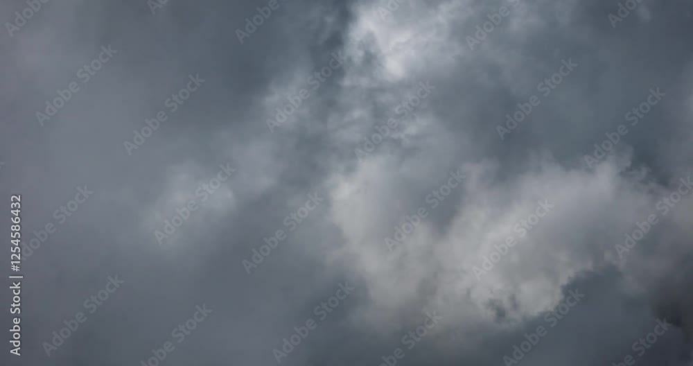 Aerial drone shot flying into dense cumulus or nimbostratus clouds before a storm in Mexico City Aerial drone shot flying into dense cumulus or nimbostratus clouds before a storm in Mexico City