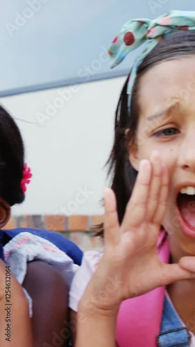 Group of kids shouting and screaming at school staircase