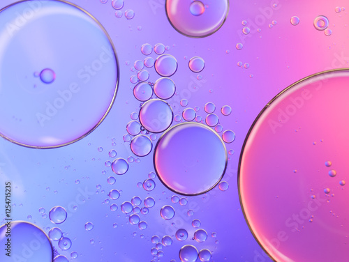 Colorful artistic of oil drop floating on the water. Abstract bubble background.
