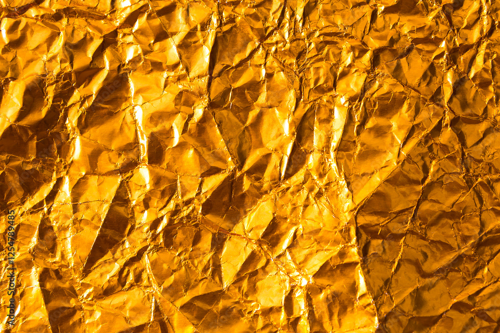 Abstract crumpled gold paper texture background, blank wrinkle paper pattern background Abstract crumpled gold paper texture background, blank wrinkle paper pattern background