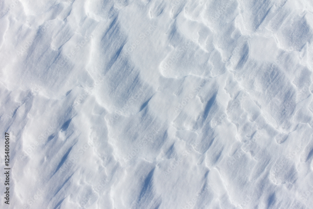 The snow is white and the ground is covered in it The snow is white and the ground is covered in it