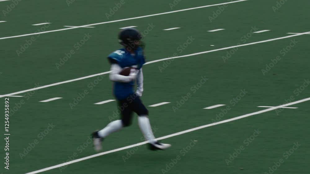 Footballer Catching the Ball and Sprinting to Score a Goal. Excited Team Celebrating Scored Points and Victory. Red and Blue American Football Teams Battle for the Championship Trophy Footballer Catching the Ball and Sprinting to Score a Goal. Excited Team Celebrating Scored Points and Victory. Red and Blue American Football Teams Battle for the Championship Trophy