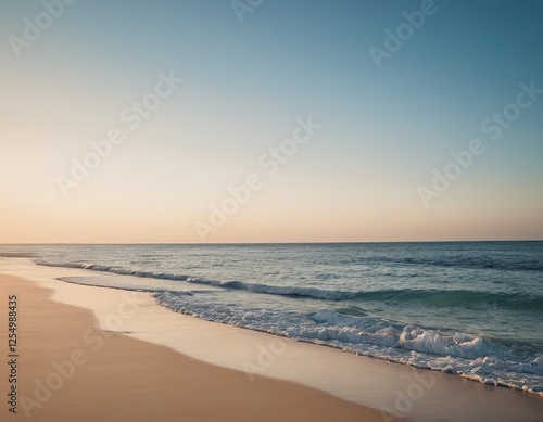 Wallpaper Mural Tranquil beach scene at sunset with gentle waves lapping against the shore. Torontodigital.ca