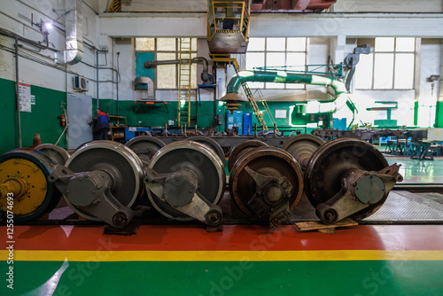 A wheelset of a metro rolling stock in close up view. photo