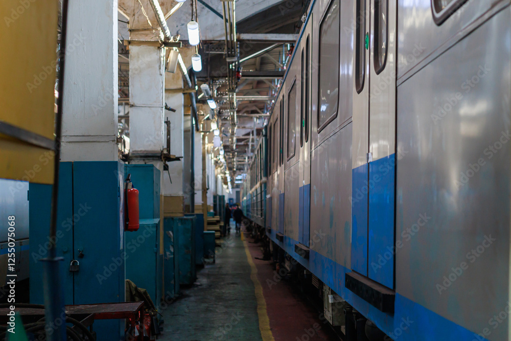Obraz premium Night layover of metro rolling stock at depot.
