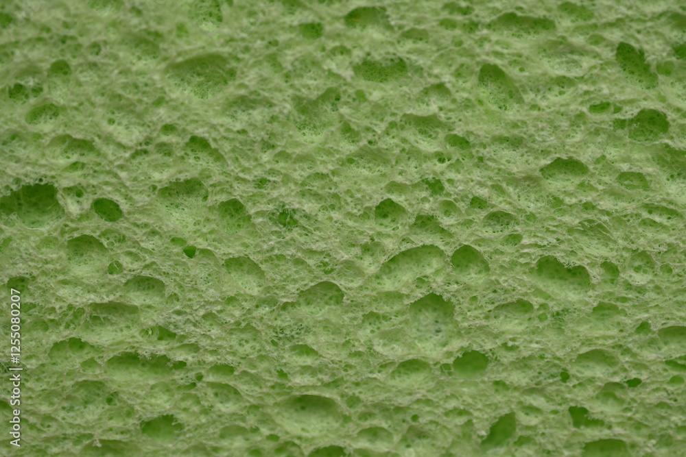 green sponge texture close up, green abstract sponge texture as background photo on top green sponge texture close up, green abstract sponge texture as background photo on top