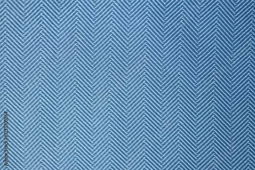 Blue silk herringbone fabric texture Light blue zigzag textile closeup Elegant woven herringbone cloth Macro blue chevron fabric pattern Classic menswear fabric texture
