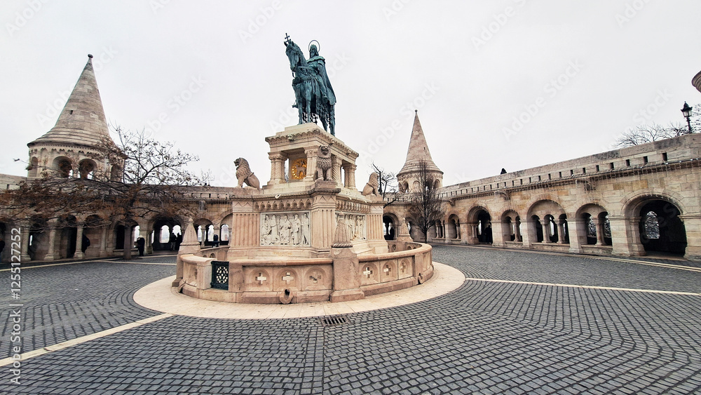 Fotografie Fortification of the Fisherman’s Bastion with the bronze Statue of Stephen I of Hungary inside the Royal Palace complex