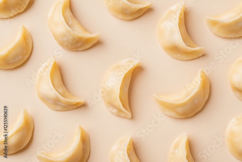 Traditional Chinese dumplings, shaped into crescent-shaped pieces photo