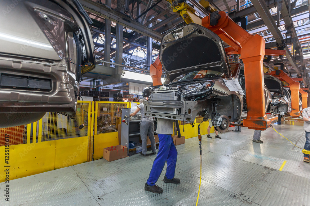 Fototapeta premium Conveyor assembly line of a passenger car.