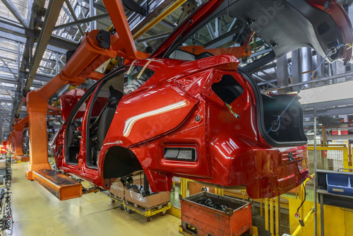 Conveyor assembly line of a passenger car. photo