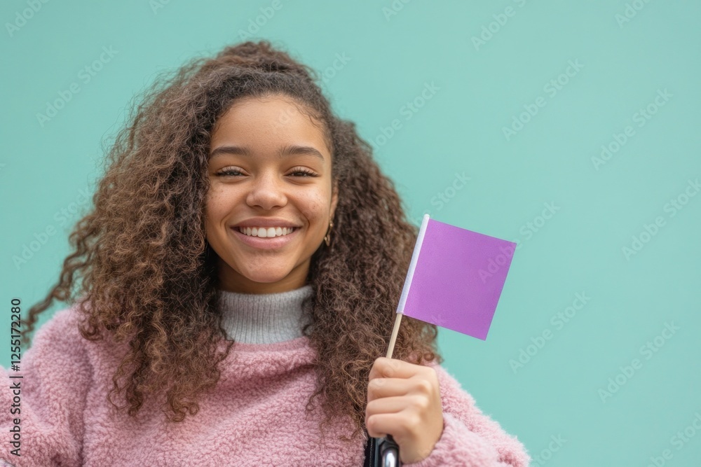 Smiling young woman holding a purple flag for awareness Smiling young woman holding a purple flag for awareness