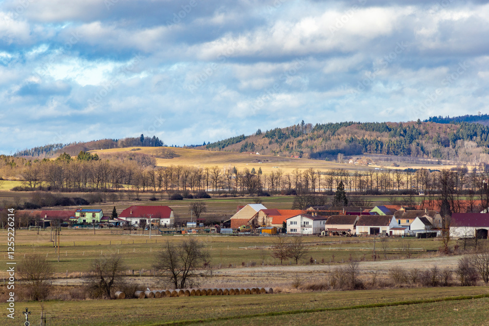 A rural landscape with villages and fields in early spring. South Bohemia, Czechia