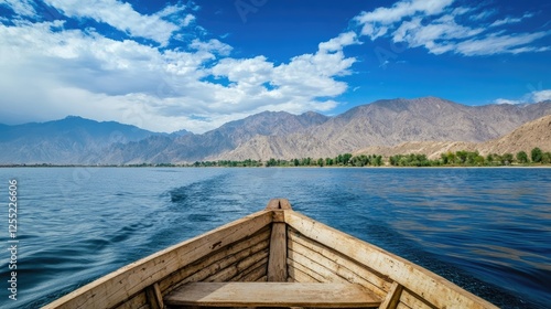 Scenic boat excursion with views of distant mountain ranges photo