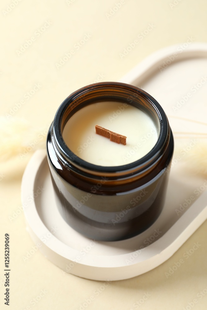 Handmade scented candle in a glass. Soy wax candle with a wooden wick Handmade scented candle in a glass. Soy wax candle with a wooden wick