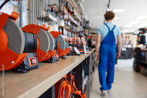 Modern sharpening wheel with grinding adhesive discs at store showcase photo