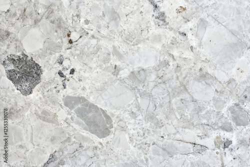 Natural texture of white marble with gray veins and polished surface photo