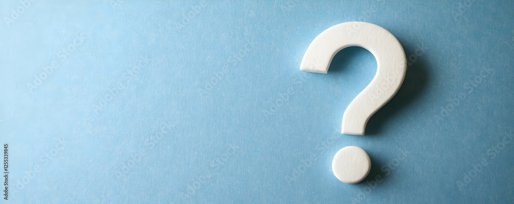 Photo of a question mark on white paper against a blue background Photo of a question mark on white paper against a blue background