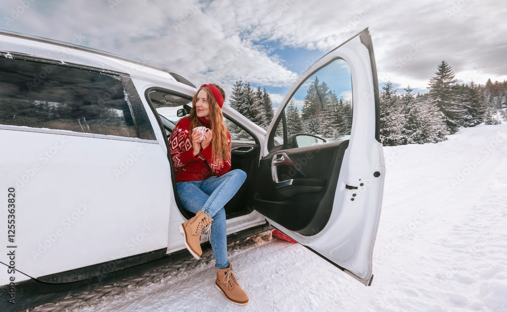 Woman Drinking Hot Drink during Road Trip