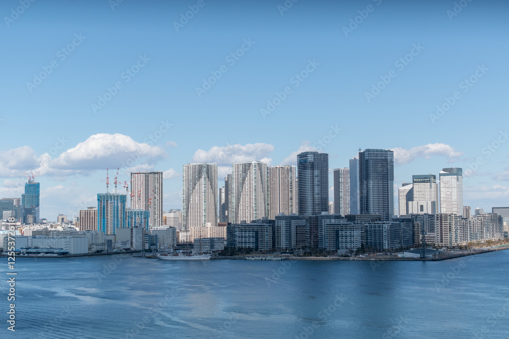 Fototapeta premium Tokyo Skyline under the blue sky on a sunny day