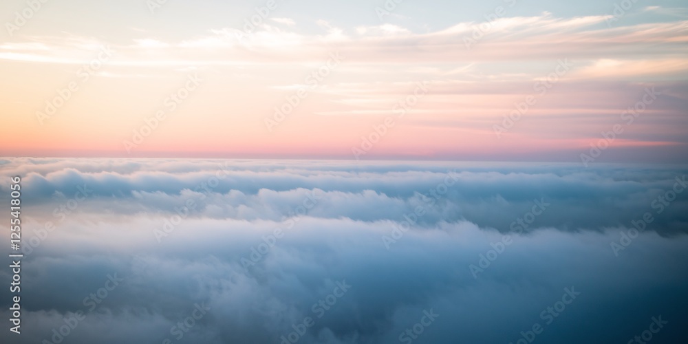 Tranquil Layers of Clouds at Sunrise. A serene view of soft, layered clouds bathed in the gentle hues of sunrise, evoking a sense of peace and endless possibility in the sky. Tranquil Layers of Clouds at Sunrise. A serene view of soft, layered clouds bathed in the gentle hues of sunrise, evoking a sense of peace and endless possibility in the sky.