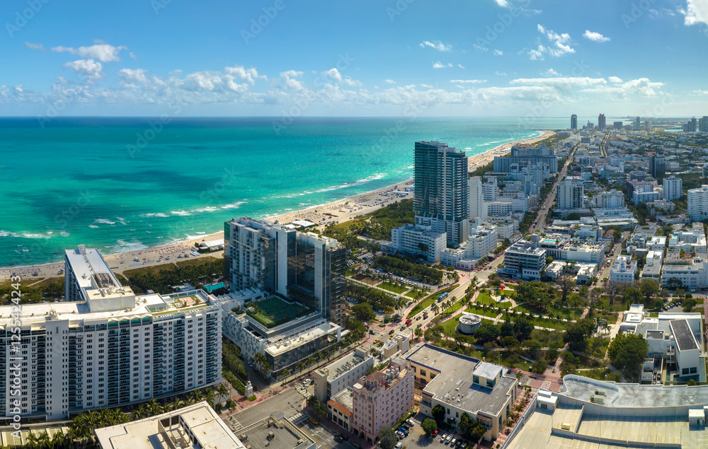 Fototapeta premium Miami Beach city with high luxury hotels and condos and sandy beachfront