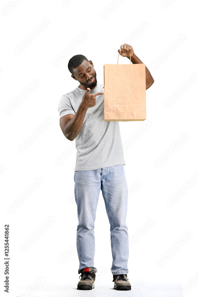 A man, full-length, on a white background, with bags