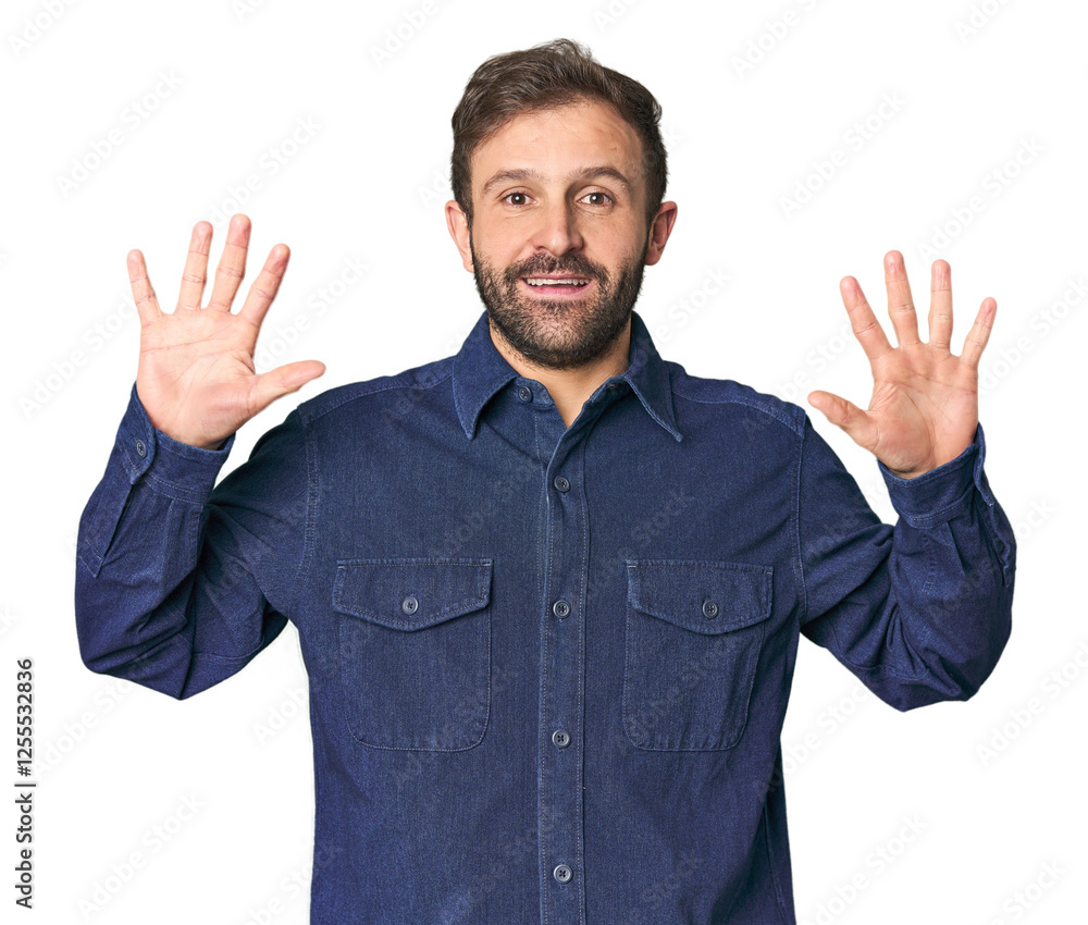 Studio portrait of young Hispanic male showing number ten with hands. Studio portrait of young Hispanic male showing number ten with hands.