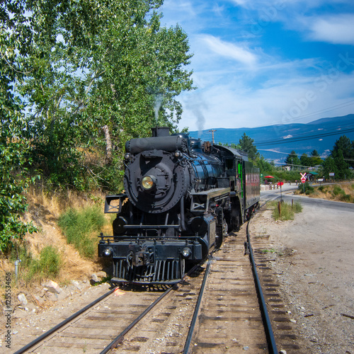 Steam Engine on a railway track, Okanagan Valley, British Columbia, Canada photo