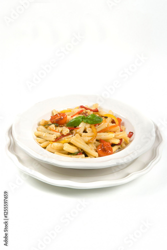 Caserecce con pomodorini or casarecce with tomatoes and chili is a typical pasta dish from Italy photo