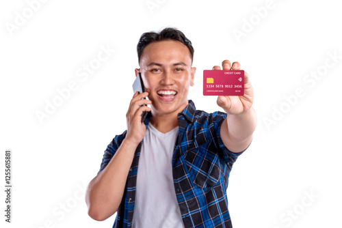 Wallpaper Mural Portrait of Asian Indonesian man in shirt talking on mobile phone while showing his credit card isolated over white background. Copy space or mockup. Concept of technology, communication, or shopping Torontodigital.ca