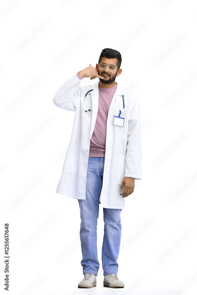 A male doctor, on a white background, in full height, shows a call sign