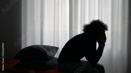 hands and body of raped woman silhouette- domestic family sexual violence at home in apartment - increase in rape and gender-based abuse - shock and fear due to a feminicide and suicide for depression