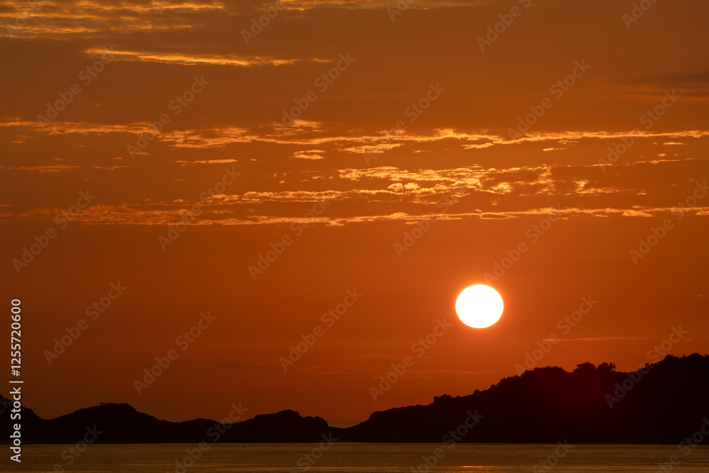 Red Sunset and Dawn at the Mid-Summer Sea Red Sunset and Dawn at the Mid-Summer Sea