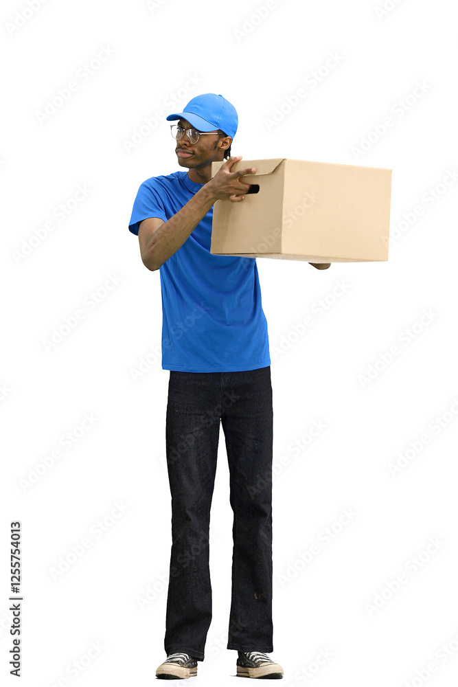 A male deliveryman, on a white background, full-length, with a box, shakes the box A male deliveryman, on a white background, full-length, with a box, shakes the box