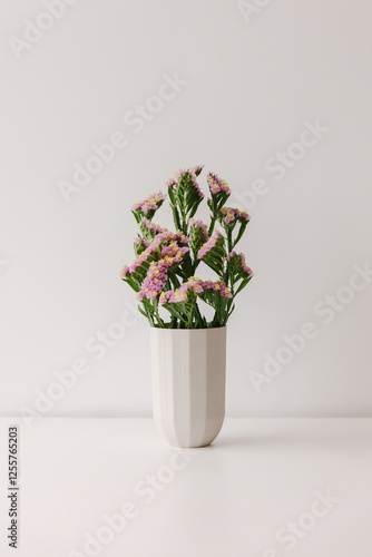 Pink common sea lavender in a vase.