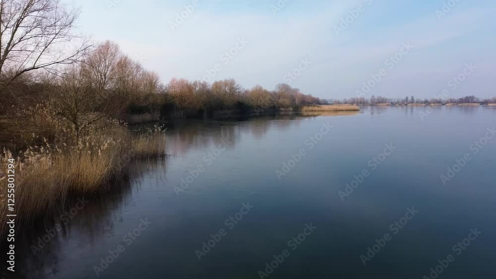 flyover lake with autumnal trees flyover lake with autumnal trees