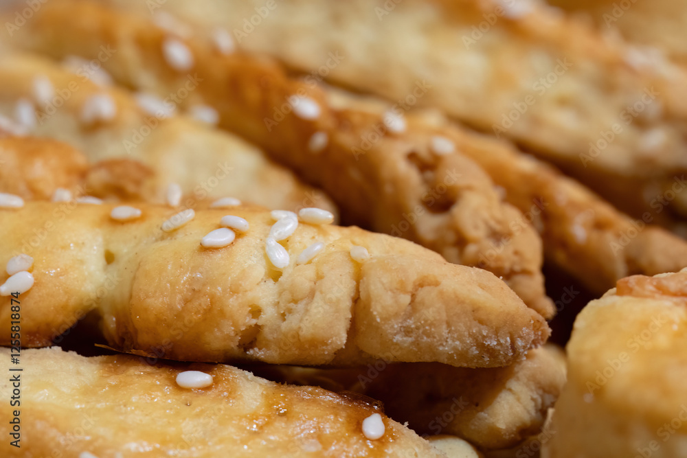 Golden brown sesame twist biscuits
Golden brown sesame twist biscuits