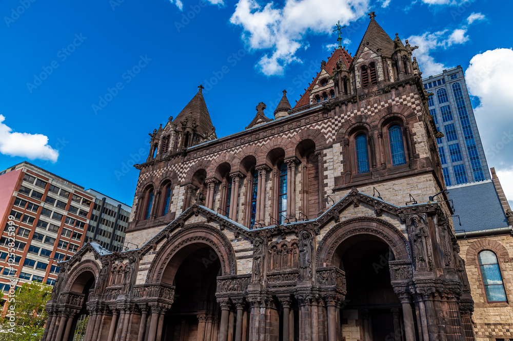A view looking up towards towards Trinity Church in Boston in the fall A view looking up towards towards Trinity Church in Boston in the fall