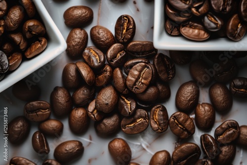 Coffee beans from different origins displayed in white bowls on a wooden surface showing rich colors and textures